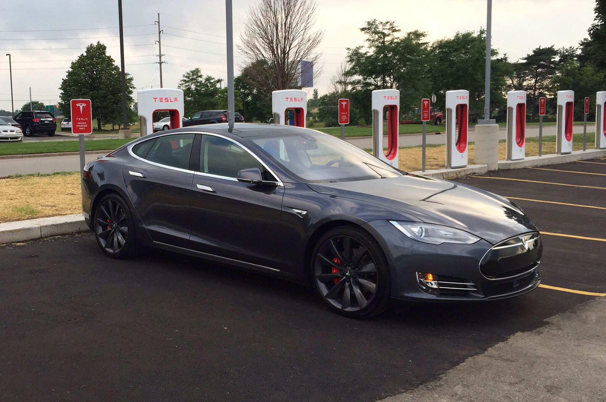 Supercharging a Tesla Model S at a Grocery Store